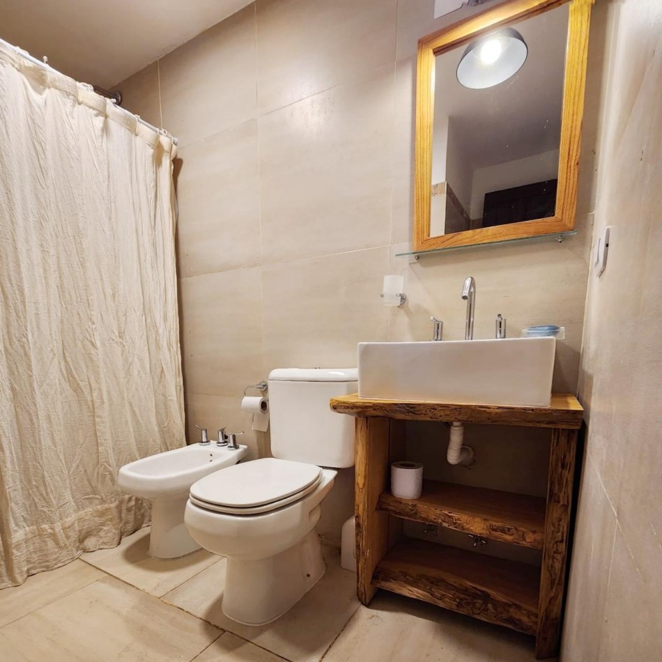 Hermosa cabaña en Carilo en complejo con amenities.